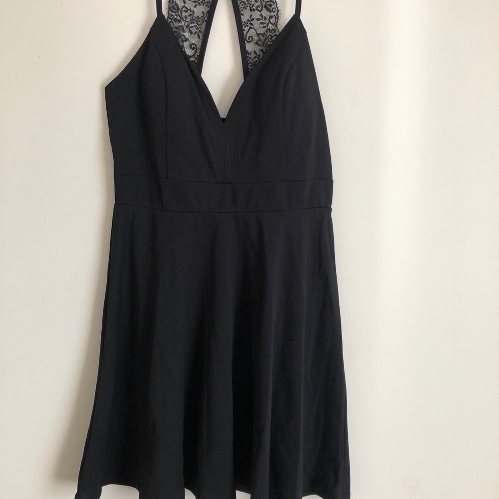 Black low cut mini dress